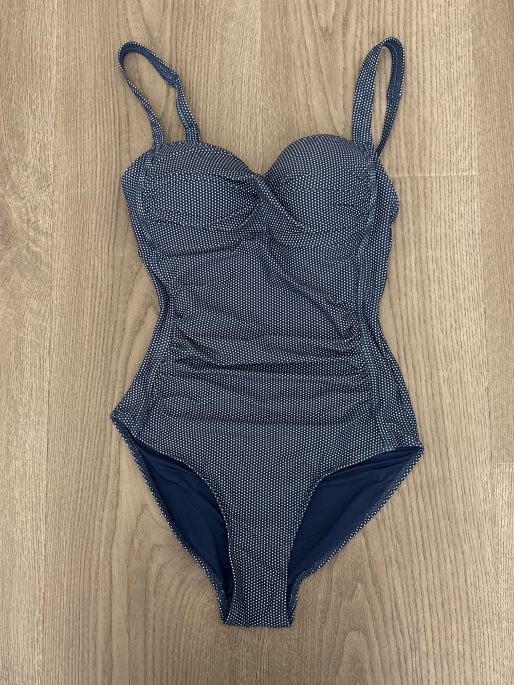 Navy blue one piece swimsuit with white polka dots size small